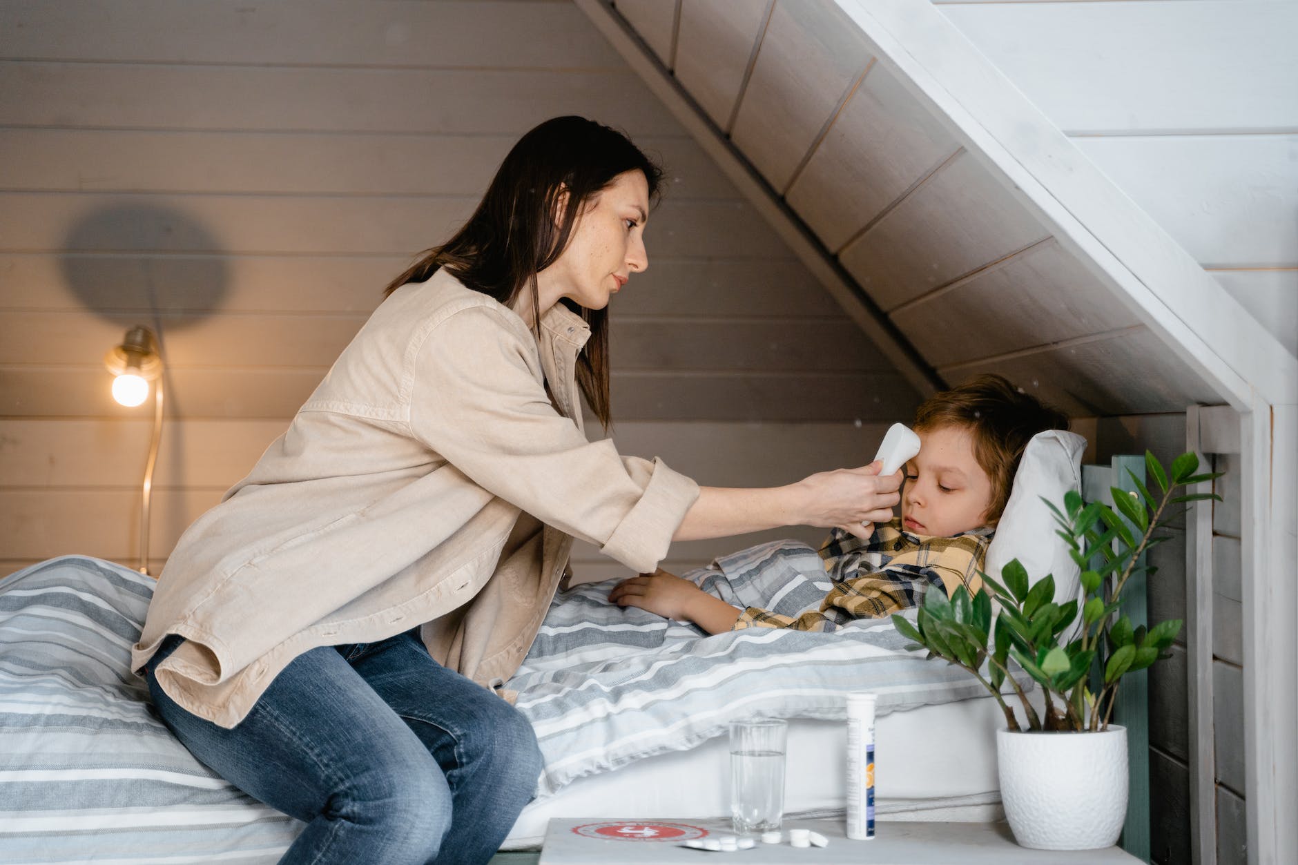 a mother caring for her sick child